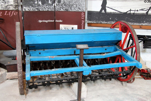 Horse-drawn seed drilling machine (1864) from Aberdeen in Museum of Farming Life at Pitmedden Garden. Pitmedden, Scotland.