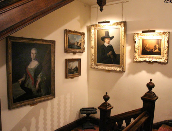 Old masters line staircase at Brodie Castle. Brodie, Scotland.
