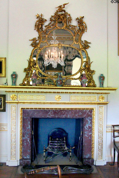 Rococo mirror with mythical Japanese birds over fireplace in Countess Agnes's Boudoir at Duff House. Banff, Scotland.