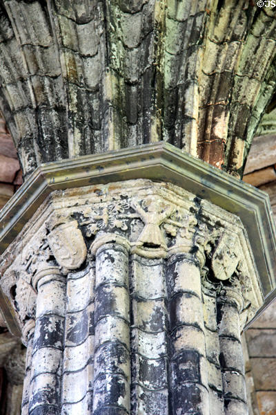 Carvings on chapter house column at Elgin Cathedral. Elgin, Scotland.