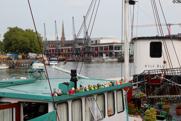 Decorative duck figures arrayed on roof of pleasure boat moored at Floating Harbour. Bristol, England.
