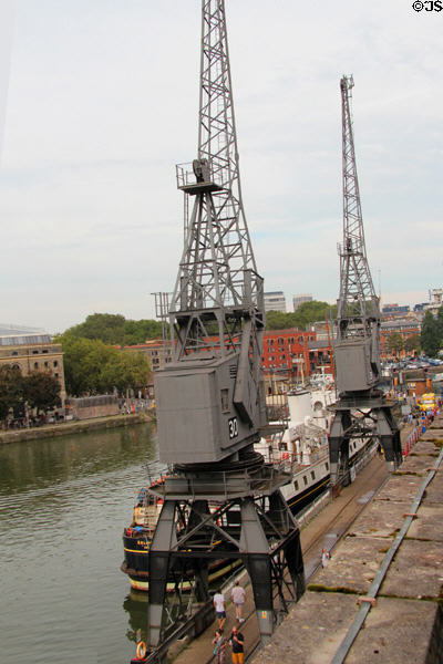 Cranes once used to move goods between ships & warehouses. Bristol, England.