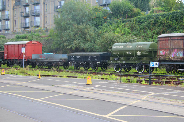 Assorted antique train cars resting on side track near Floating Harbour. Bristol, England.