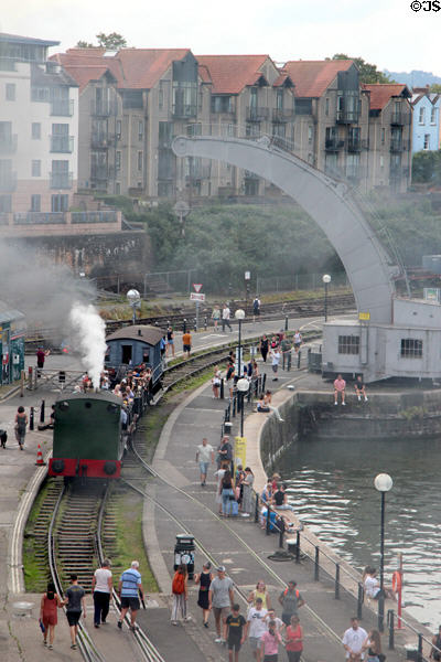 Steam locomotive & visitors along Floating Harbour. Bristol, England.