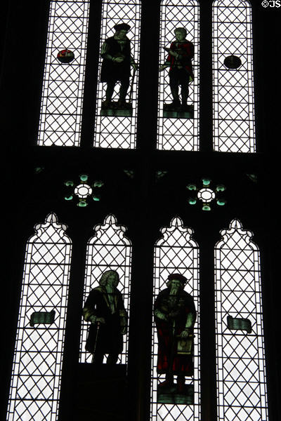 Panels of remaining figures in stained glass windows mostly destroyed during WWII. Bristol, England.