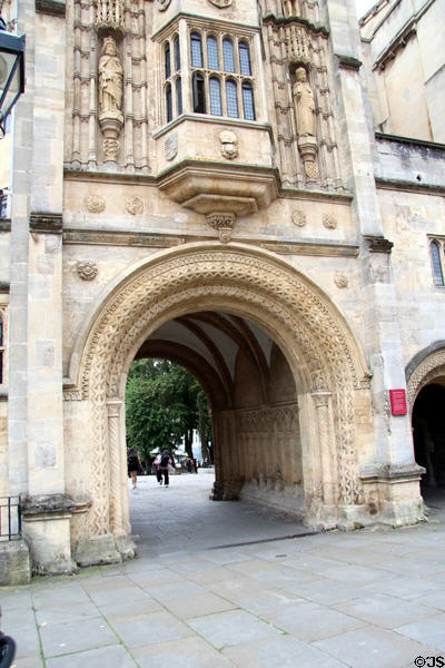 Romanesque arch of Abbot's Gatehouse with medieval statues above. Bristol, England.