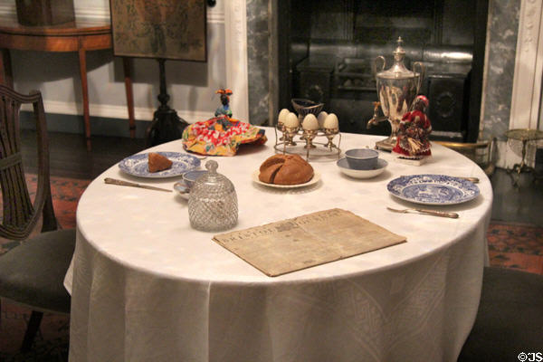 Dining table set for breakfast in parlor at Georgian House Museum. Bristol, England.