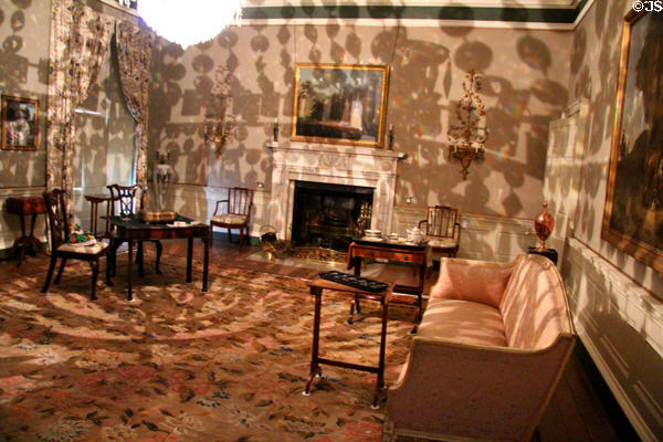 Drawing room with shadows from chandelier at Georgian House Museum. Bristol, England.