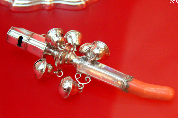 Teething stick (c1775) made by Thomas Nash (London) which combined functions of rattle & coral for a baby to chew on at Bristol Museum & Art Gallery. Bristol, England.