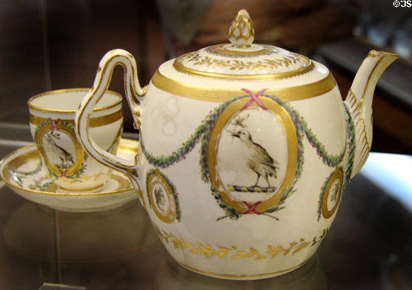 Porcelain teapot, cup & saucer (c1775) from Chough service (named after the featured bird), likely commissioned by an unknown family, made at Bristol Porcelain factory, at Bristol Museum & Art Gallery. Bristol, England.