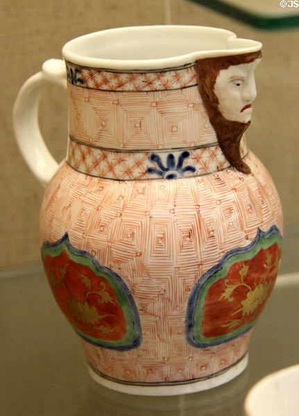 Ceramic jug (c1775) with moulded mask lip at Bristol Museum & Art Gallery. Bristol, England.