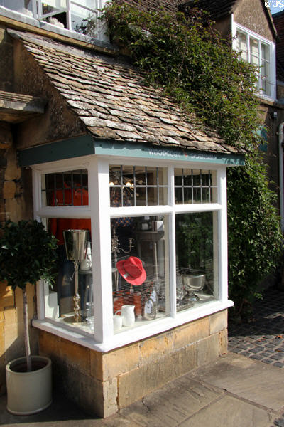 Front windows of typical small shop. Broadway, England.