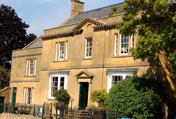 Large city residence constructed of the honey colored stone typical of the town. Broadway, England.