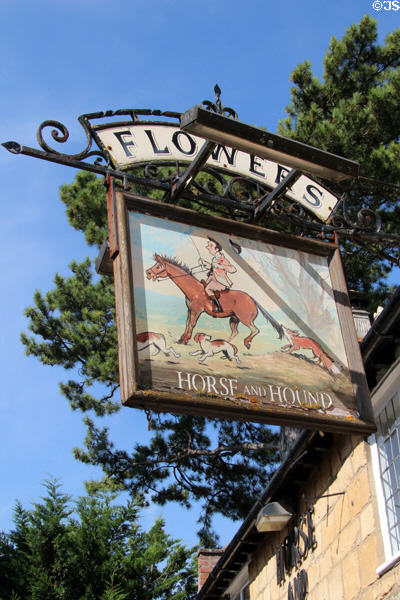 Old fashioned pub sign which hangs from building across from Broadway Museum & Art Gallery. Broadway, England.