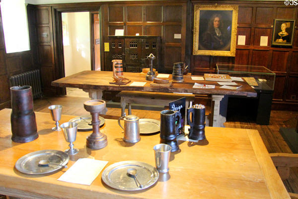 Antique pewter decorative arts, eating utensils and tankards such as might have been used at a 17thC inn at Broadway Museum & Art Gallery. Broadway, England.