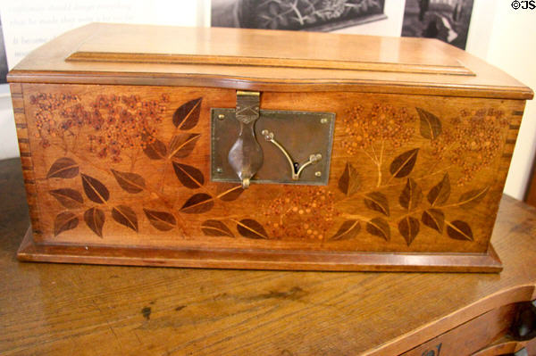 Lace or glove box (1926) made of English walnut with inlays of other woods to form an elderflower designed by Sir Gordon Russell as a specially commissioned piece at Gordon Russell Design Museum. Broadway, England.