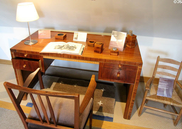 Writing desk (1930) made with Indian rosewood veneer, a boxwood frieze & handles & a bog oak base, designed by Edin Minns at Gordon Russell Design Museum. Broadway, England.