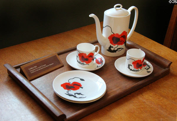Coffee set with red poppy design by Susie Cooper at Gordon Russell Design Museum. Broadway, England.