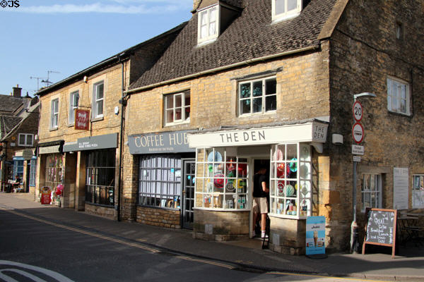 Shops lining main street. Bourton-on-the-Water, England.