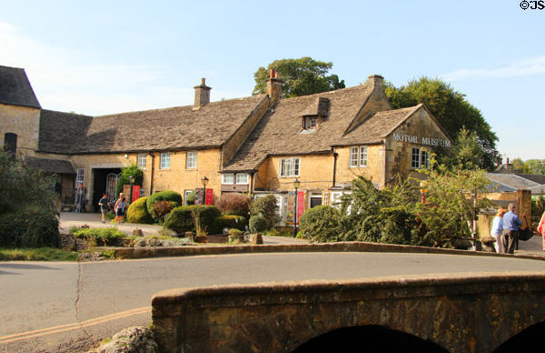 Old Mill in town center housing Cotswold's Motoring Museum & Toy Collection (opened 1978). Bourton-on-the-Water, England.