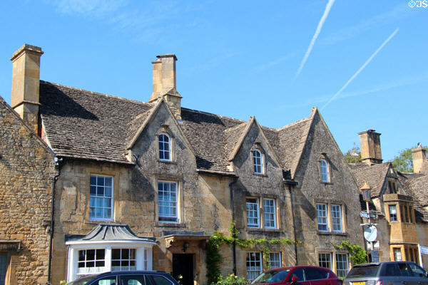 Vintage Cotswold stone row houses on High St. Chipping Campden, England.