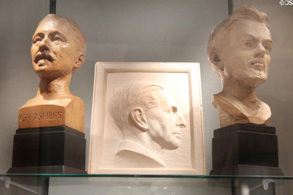Bust of C.R. Ashbee (1927) plaster cast in relief of Gerard Bishop (1949) & bust of Laurence Housman (1924) all associated with Guild of Handicraft at Court Barn Museum. Chipping Campden, England.