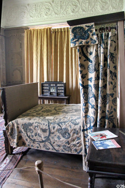 Matching crewelwork bedspread & curtain (1720s) in Fettiplace Room at Chastleton House. Moreton-in-Marsh, England.
