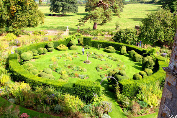 Hedge enclosed garden with topiary display at Chastleton House. Moreton-in-Marsh, England.