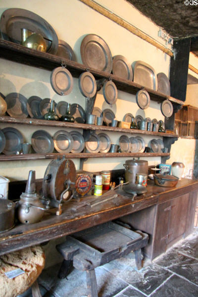 Pewter plate collection & array of antique kitchen equipment at Chastleton House. Moreton-in-Marsh, England.