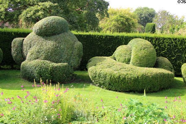 Topiary sculptures on lawn at Chastleton House. Moreton-in-Marsh, England.