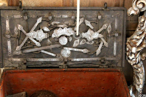 Antique safe with locking mechanism visible at Snowshill Manor. England.