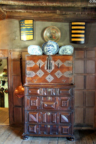 Ornately carved wooden chest at Snowshill Manor. England.