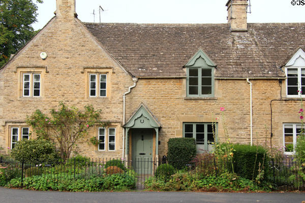 Home constructed of Cotswold stone with typical Cotswold roof. Lower Slaughter, England.