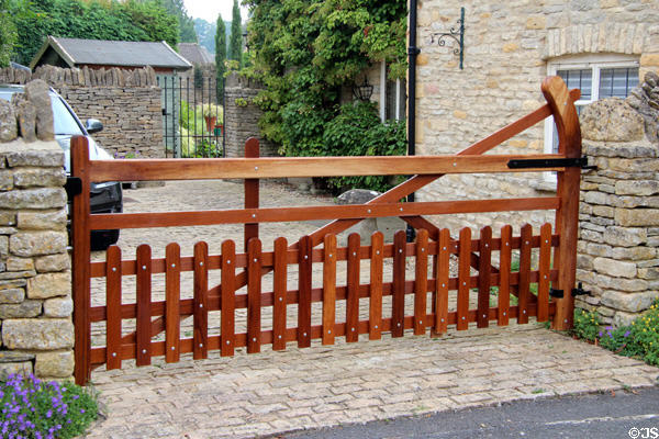 Wooden driveway barrier. Lower Slaughter, England.