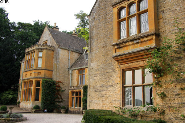 Cotswold stone residence with "bump out" or oriole window. Upper Slaughter, England.