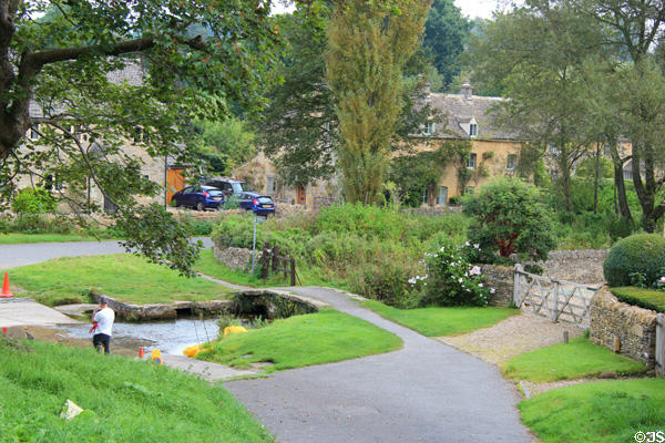 Hill leading into town & River Eye. Upper Slaughter, England.