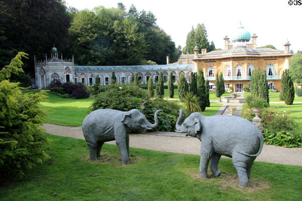 Two elephant statues set on slope outside Sezincote House. Moreton-in-Marsh, England.