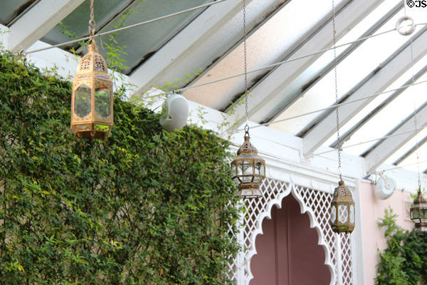 Decorative lantern hanging from sloped ceiling in Orangery at Sezincote. Moreton-in-Marsh, England.