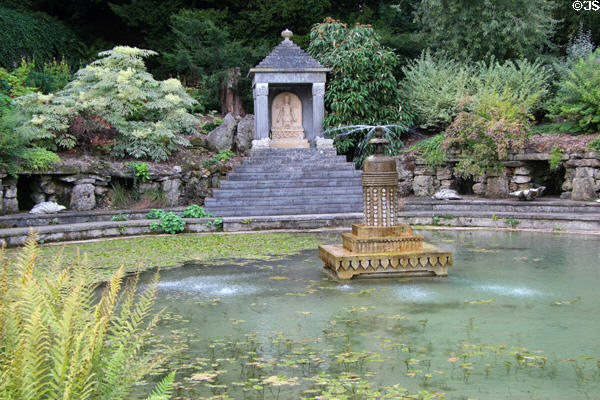 Spring fed pool with fountain & Temple to Surya at Sezincote. Moreton-in-Marsh, England.