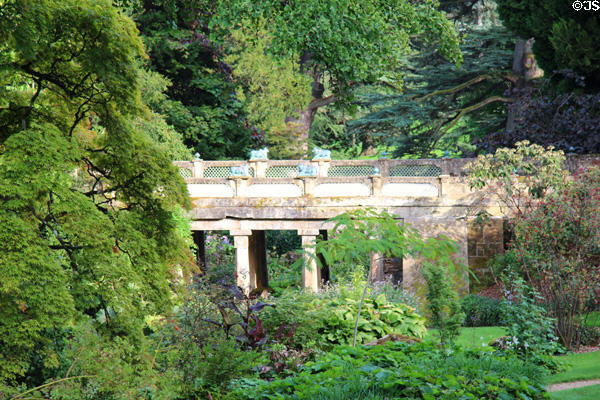 Footbridge across stream at Sezincote. Moreton-in-Marsh, England.
