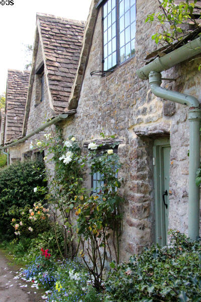 Flowers & plantings gracing front of weavers' cottages. Bibury, England.