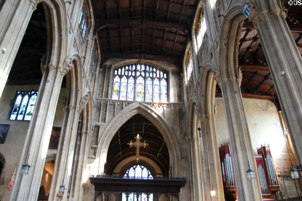 Aisle of Church of St John Baptist with supporting arches. Cirencester, England.
