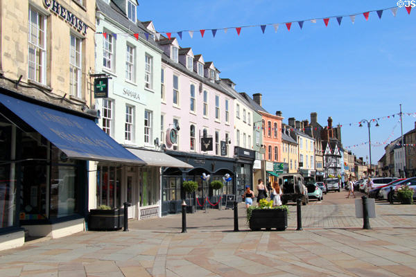 Market Place shopping street where weekly markets are held. Cirencester, England.