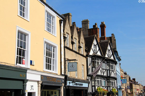Antique buildings with steep gables on Market Place. Cirencester, England.