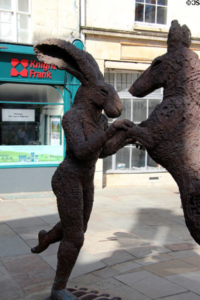 Hare & Donkey Dancing sculpture (2018) by Sophie Ryder on Market Place. Cirencester, England.