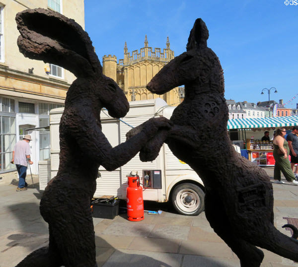 Hare & Donkey Dancing sculpture (2018) by Sophie Ryder on Market Place. Cirencester, England.