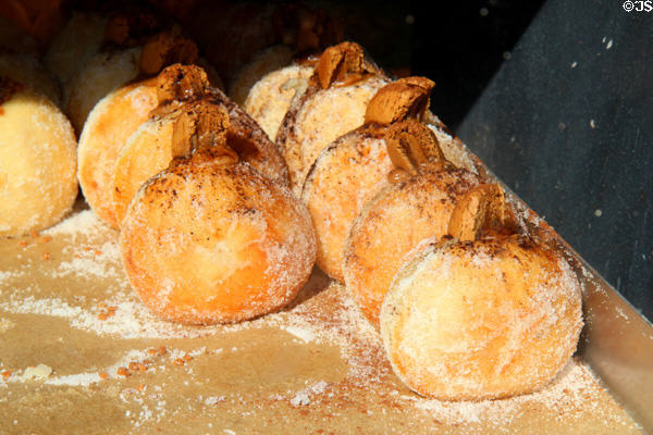 Pastries in shop window. Cirencester, England.