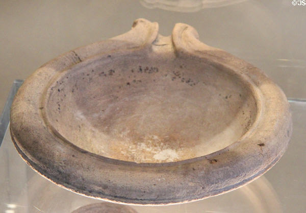 Roman era pottery vessel with pouring spout at Corinium Museum. Cirencester, England.