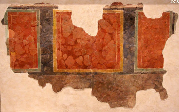 Section of wall plaster from 1stC shop in Cirencester at Corinium Museum. Cirencester, England.