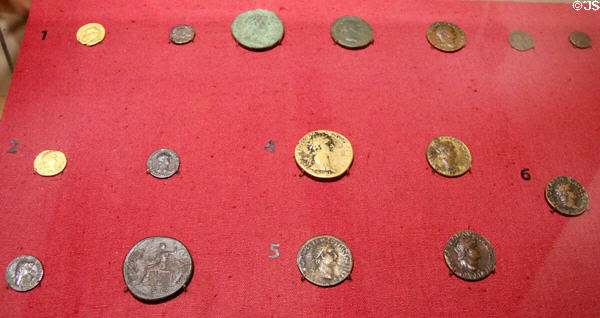 Display of Roman coins used in 1st & 2'nd C at Corinium Museum. Cirencester, England.